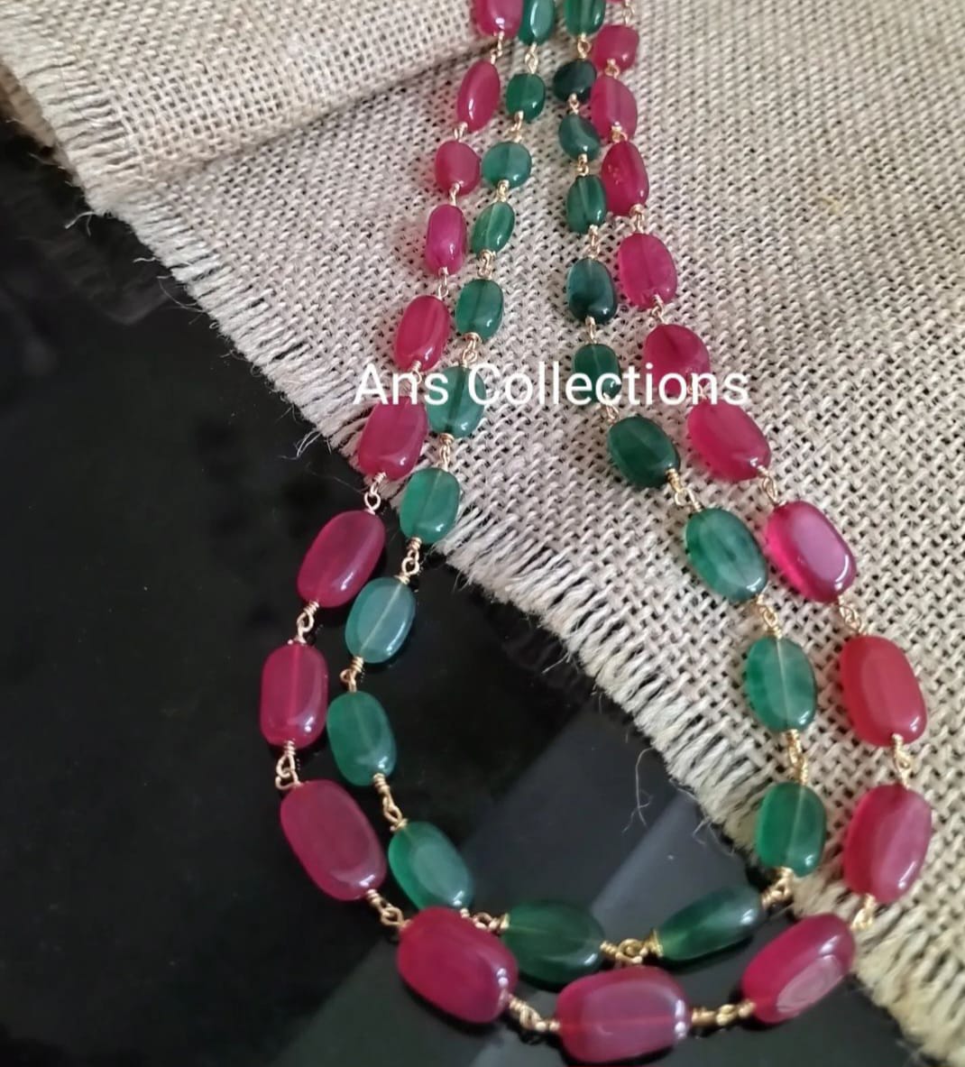 Semi-precious ruby and emerald double line