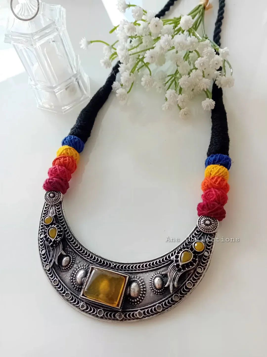 Metal pendant with dori