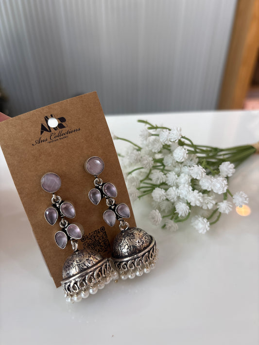Baby pink stone oxidised metal jhumka