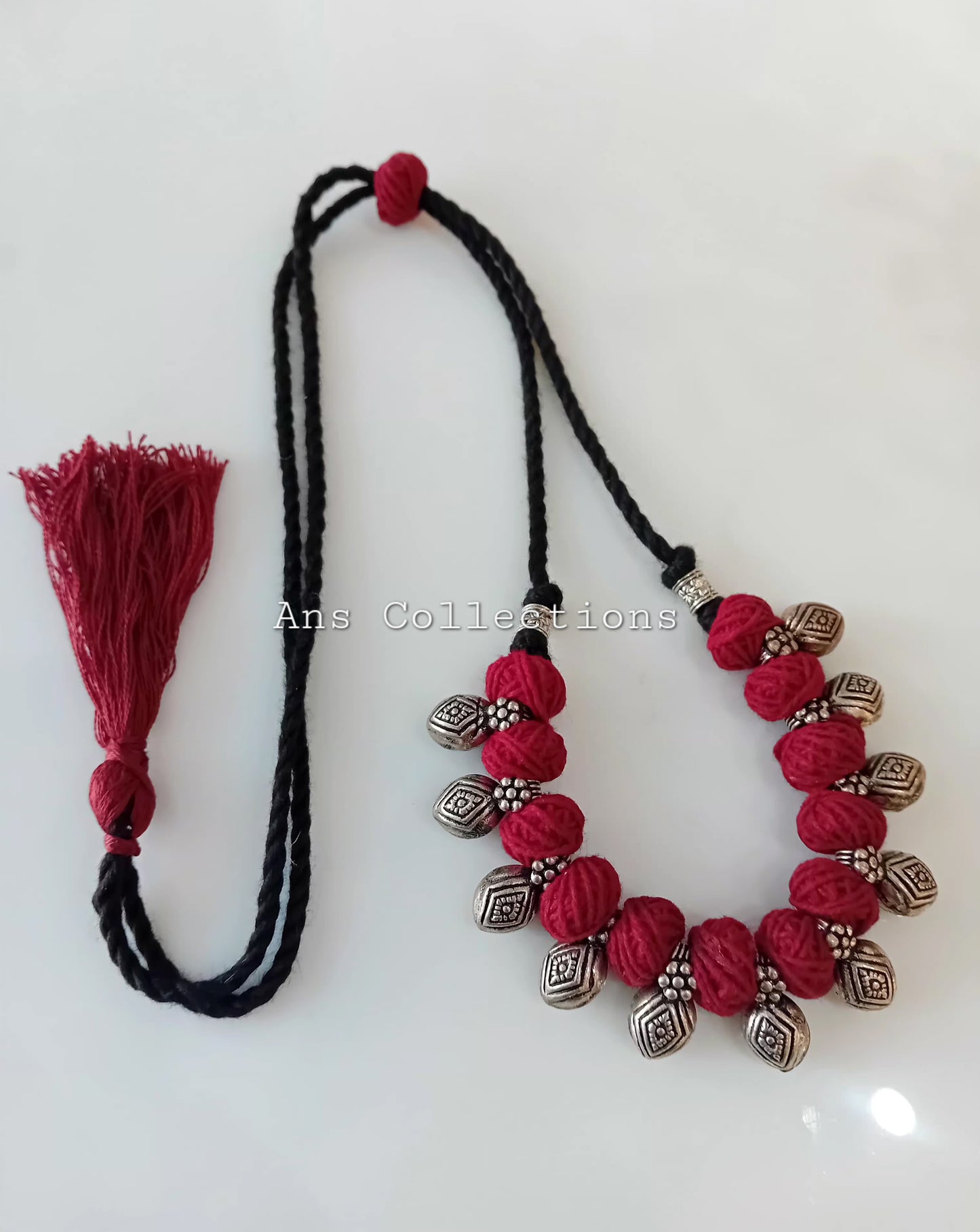 Kolapuri charms with thread ball