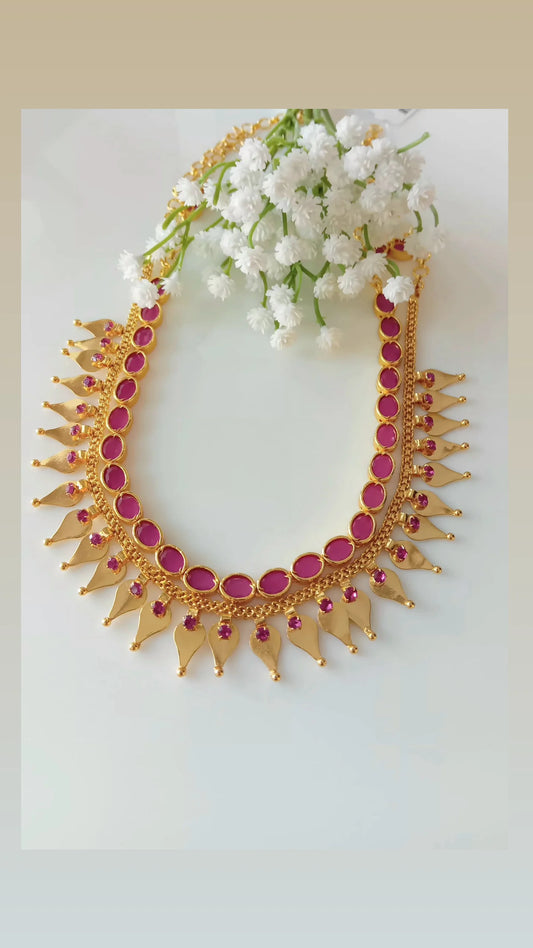 Thaalikkottam with ruby stone neckpiece