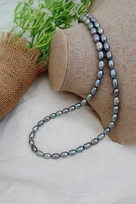Grey rice shaped freshwater pearl