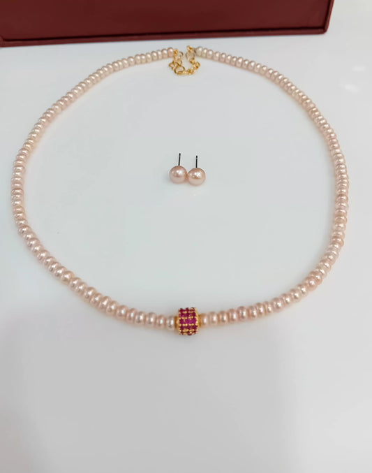 Button shaped pink pearl
