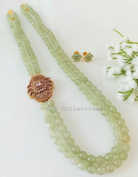 Pastel green natural stone beaded neckpiece with victorian side brooch