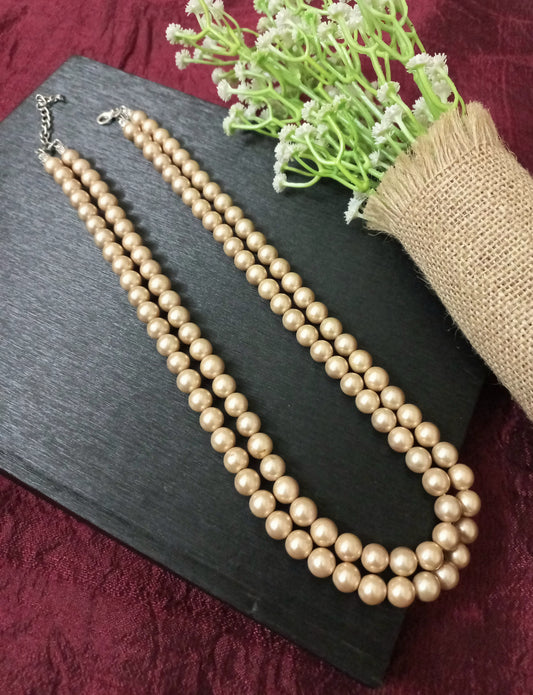 Two layer golden yellow shell pearl